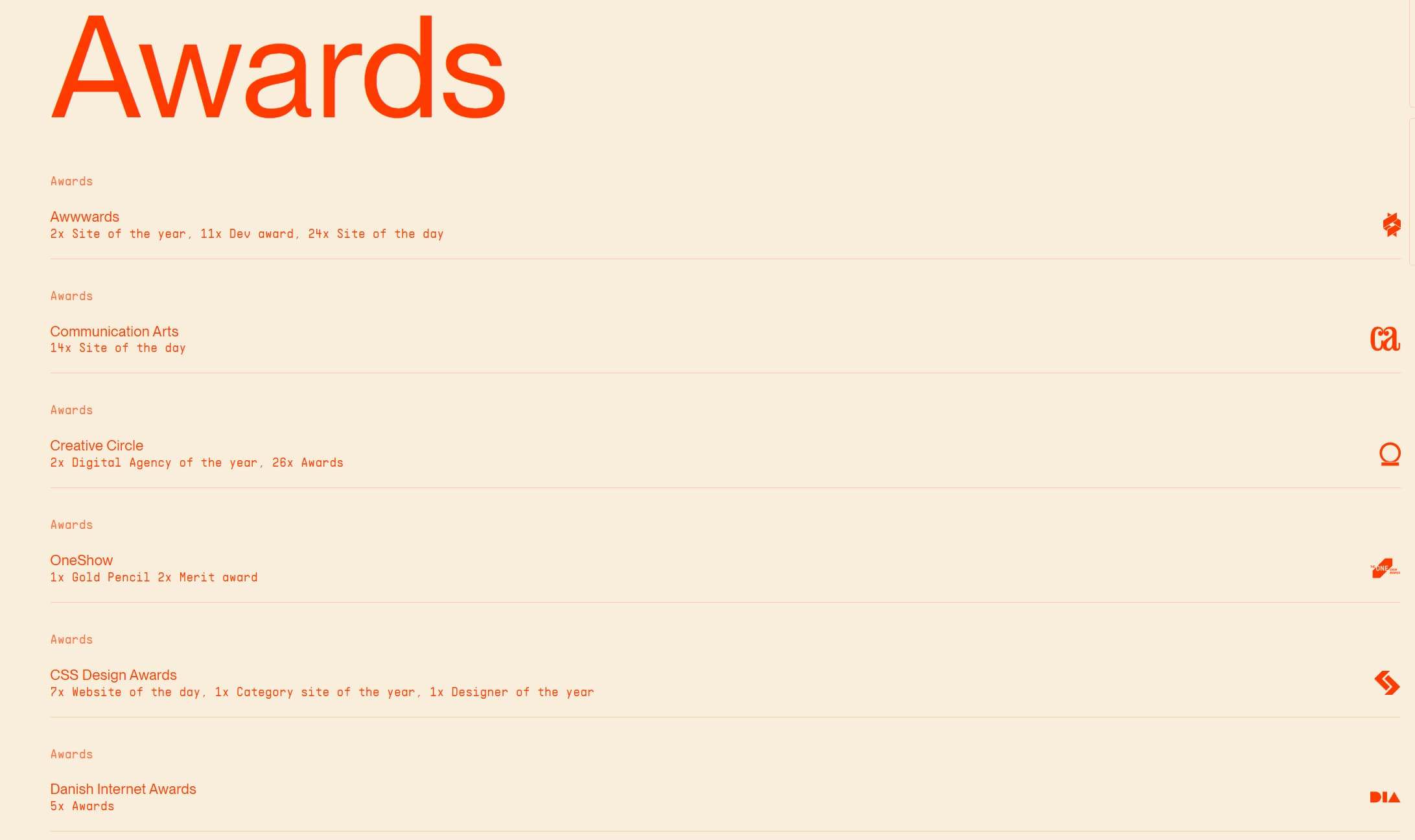 Minimal webpage listing awards with large orange heading and repeated award entries on a pale background.