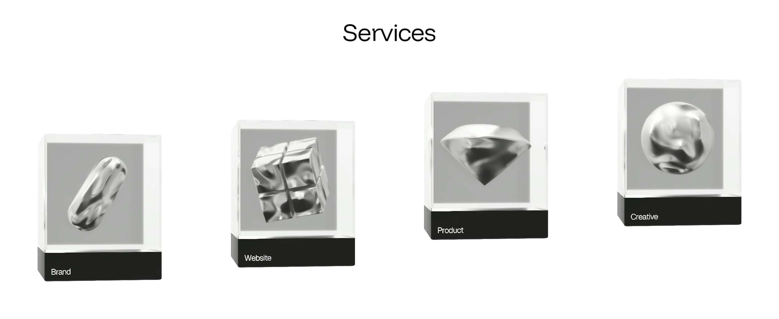 Four glass display boxes each holding a metallic abstract object and a dark label at the base.