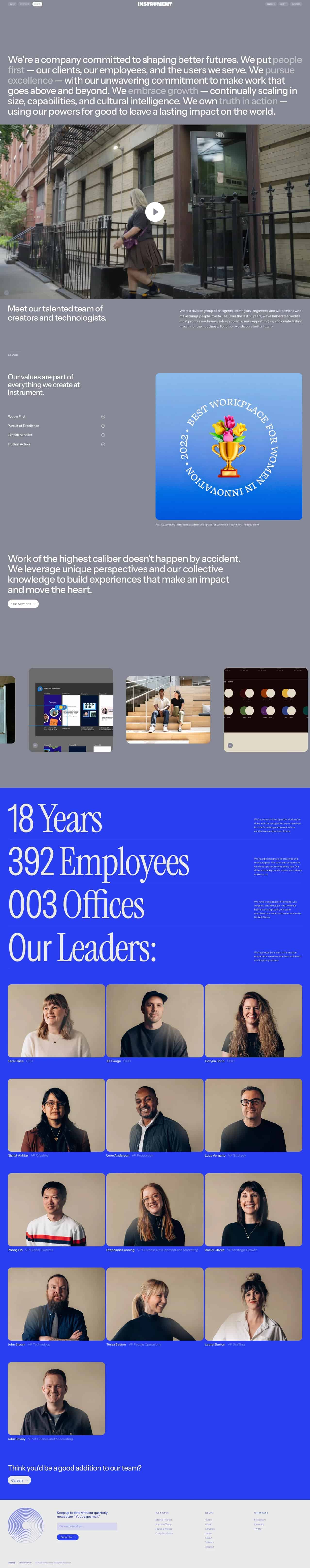Long single-page company site with a hero statement, embedded video, team highlights, awards card, portfolio thumbnails, large statistics block, and a grid of leader portraits.