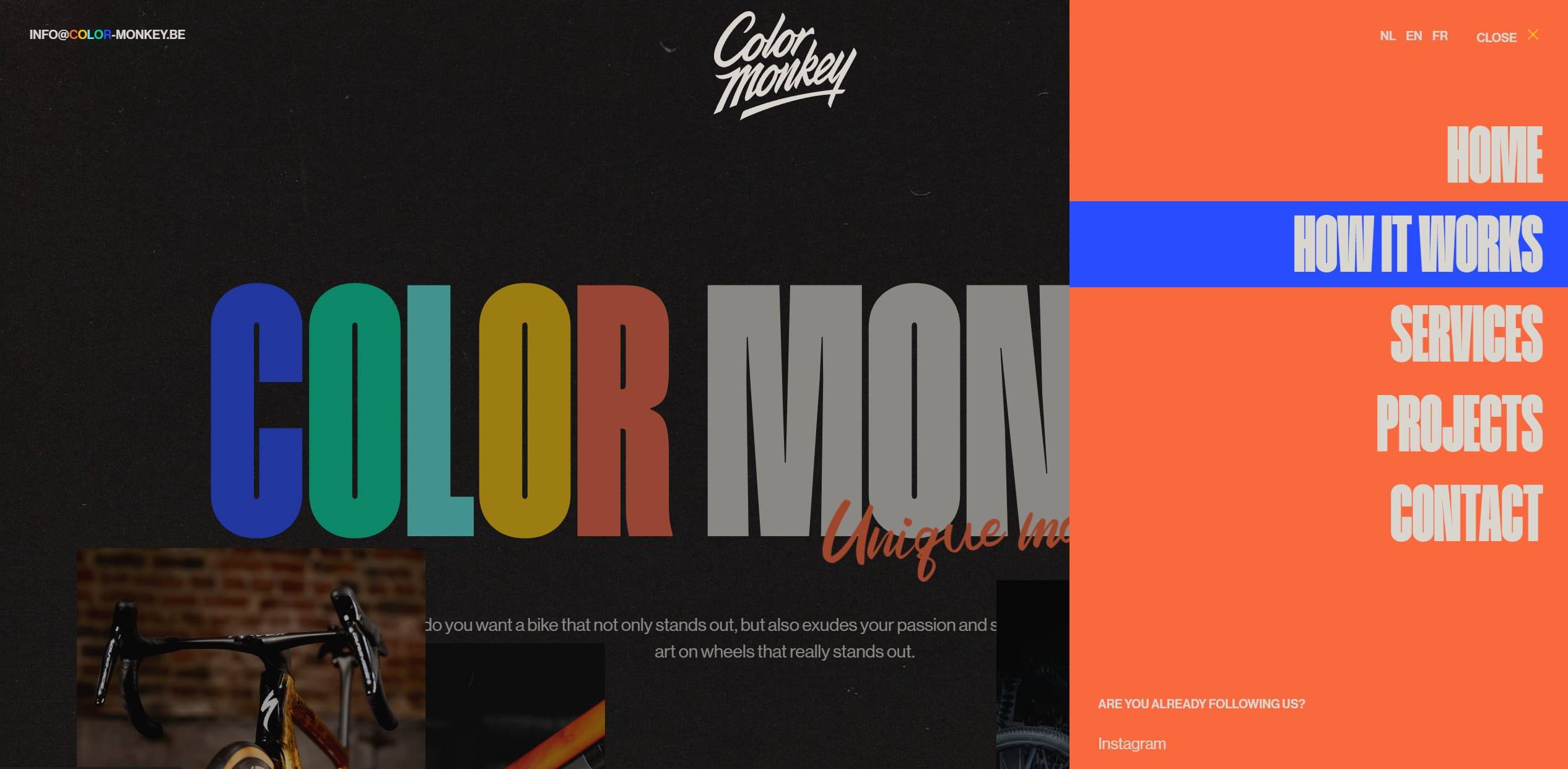 Dark textured site background with oversized multicolored headline lettering and a tall orange right-side navigation panel listing menu items in condensed white type.